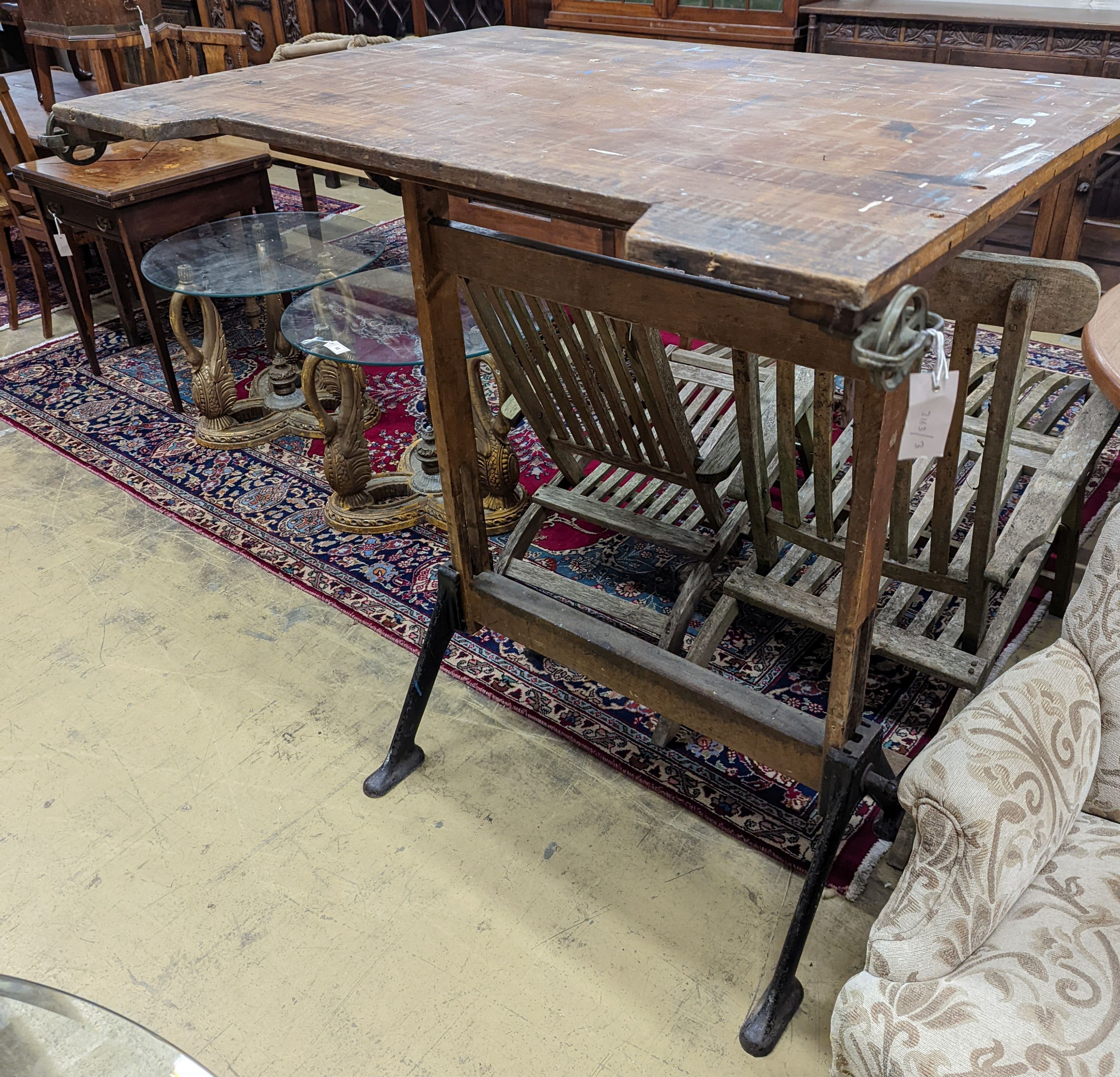 A vintage pine and cast iron draughtsman table, by R J Hall and co-Ltd Westminster W-116cm, D-95cm, H-127cm. (Table flat)